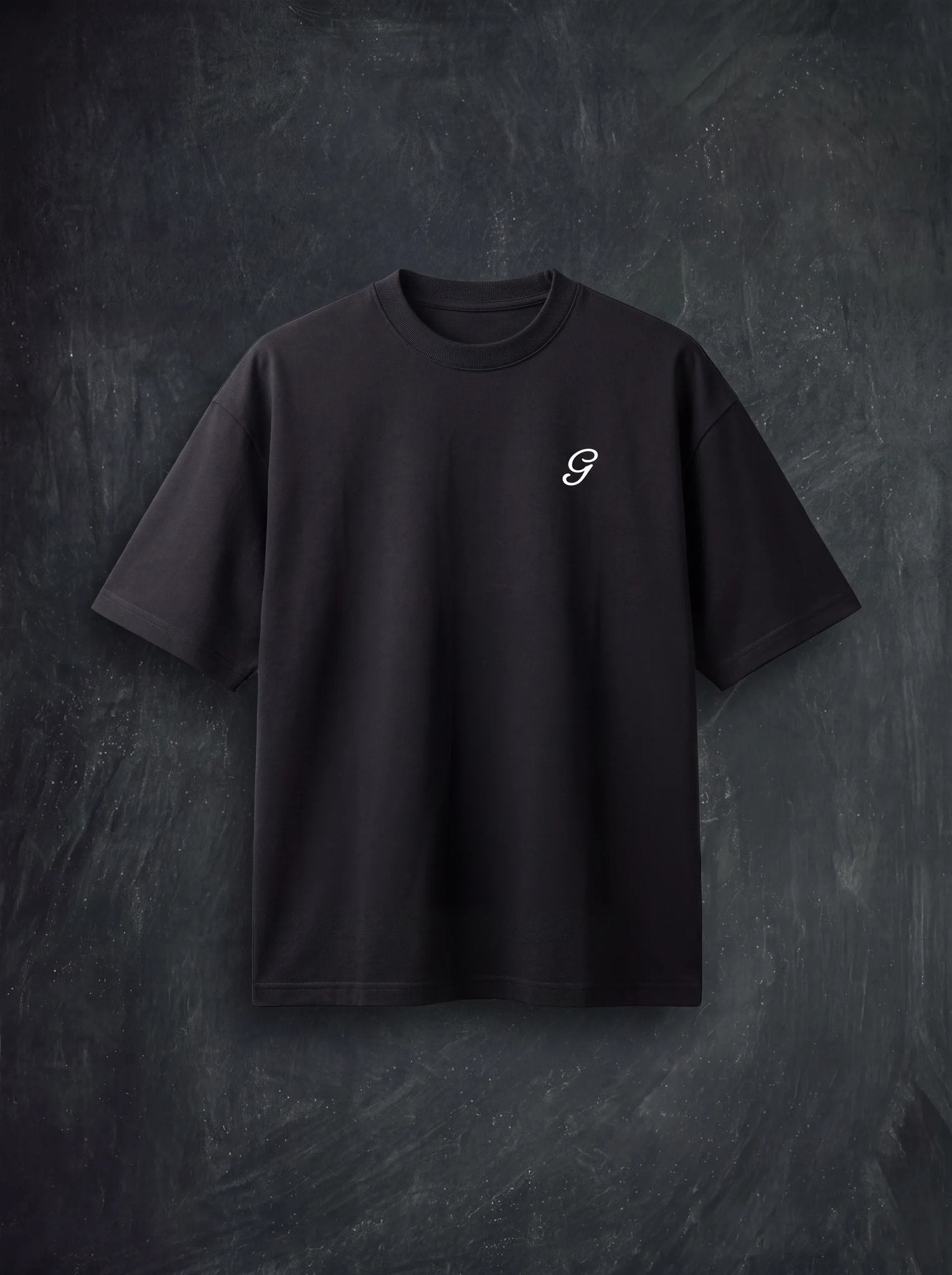 Black front: Black Chez Greenberg t-shirt with white script G logo on the chest